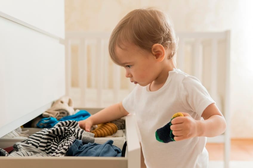 Using Regular Detergents or Harsh Chemicals to Wash Baby Clothes